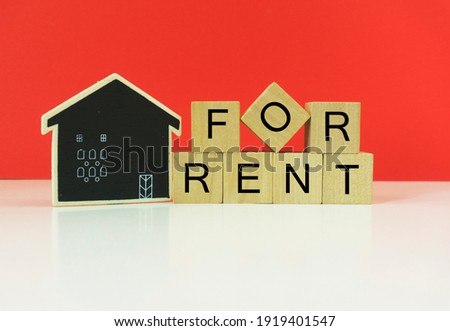 FOR RENT Text on Wooden Blocks.