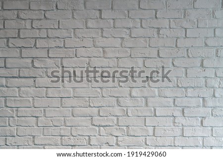 White cream brick wall background texture in a house or in an office building