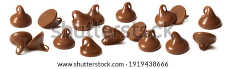 Chocolate drops or chips selection isolated on white background. Package design element with clipping path.  Royalty-Free Stock Photo #1919438666
