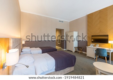 Interior photography, modern hotel room, with twin beds, in modern style