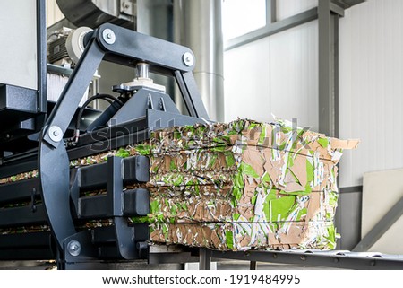 paper recycling truck and forklift loading old papers reuse Royalty-Free Stock Photo #1919484995