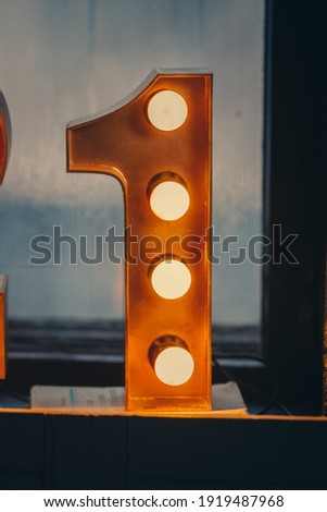 New Year 2021 Creative Design Concept numbers from yellow bulbs one 1