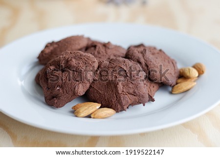 Plate of homemade Chocolate and Almond Cookies made at home. Delicious and healthy. Perfect for any celebration.