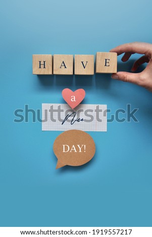Creative caption: have a nice day! on a blue background