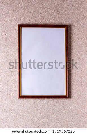 Poster mockup with rectangular frame hanging on the wall in room 