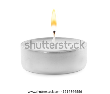 Small wax candle isolated on white. Beautiful decor Royalty-Free Stock Photo #1919644556