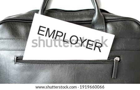 Text employer, writing on white paper sheet in the black business bag. Business concept