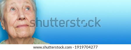 Cataract concept. Senior woman's eye, closeup and cataracts and healthy eye concept Royalty-Free Stock Photo #1919704277