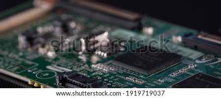Microcontroller pcb. Close up printed circuit board of an electronic device Royalty-Free Stock Photo #1919719037