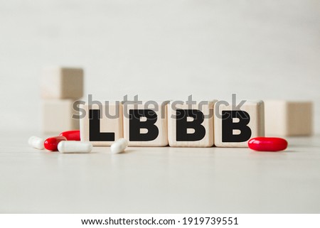 LBBB. THE WORD WRITTEN ON CUBES, PILLS . MEDICAL CONCEPT