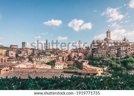 Panorama of Siena old town with Cathedral and Palazzo Pubblico (town hall), view of ancient city in the Tuscany region of Italy, Europe.