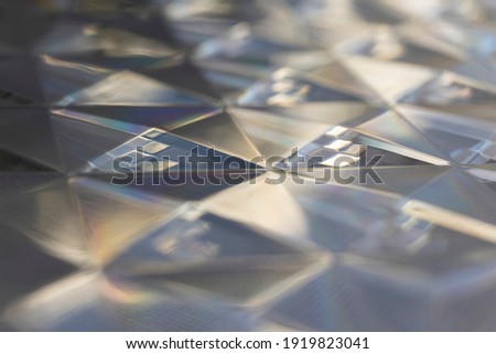 Transparent plastic with a rhomboid embossed pattern