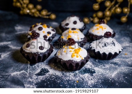 chocolate muffin with tangerine and chocolate pieces