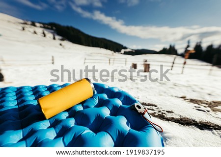 A close up of a snow covered field