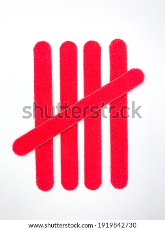 Five Red Nail Files White Background