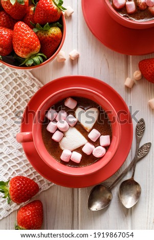 Hot chocolate with heart-shaped marshmallows. A delicious idea for a Valentine's Day sweet drink, dessert