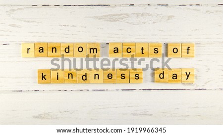Random Acts of Kindness Day.words from wooden cubes with letters photo