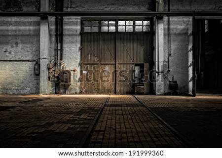 Industrial interior of an old factory building Royalty-Free Stock Photo #191999360