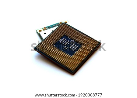 processor for a computer lies on a white isolated background Royalty-Free Stock Photo #1920008777