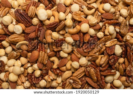Mix of nuts as a background. Top view.  Royalty-Free Stock Photo #1920050129
