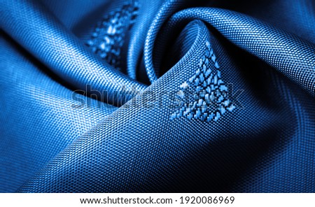 silk fabric, dark blue, grayish blue, small pattern, pattern, which is a combination of lines, colors, shadows. texture background, pattern