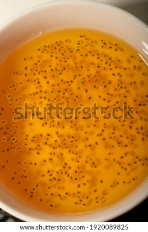 White bowl with orange sesame and mango vegetarian dish. Homemade Vegan Food