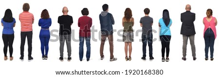 rear view of a group of woman and men with arms crossed on white background   Royalty-Free Stock Photo #1920168380