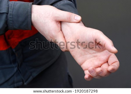 Wrist pain after working hard
 Royalty-Free Stock Photo #1920187298