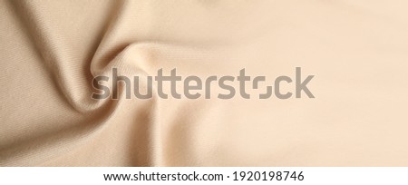 Beige soft cashmere fabric as background, closeup view with space for text. Banner design Royalty-Free Stock Photo #1920198746
