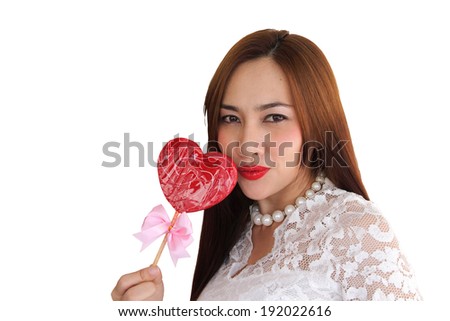 woman happy in candy shape heart on isolated