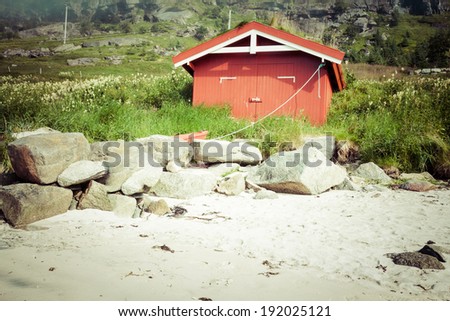 Red house by the see in Lofotn Islands