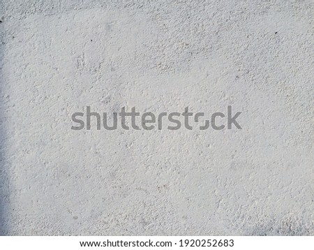 White painted cement wall texture. Abstract grunge gray cement texture background. White concreted wall for interiors or outdoor exposed surface polished concrete.