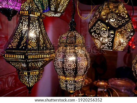 
Mysuru,Karnataka,India-February 10 2021;  A Beautiful picture of Handmade Electric Lamp shades using the black metal by the native Indian tribe in Karnataka.
