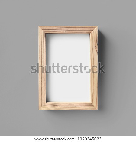 Photo frame template on gray paper background. Top view. Flat lay.