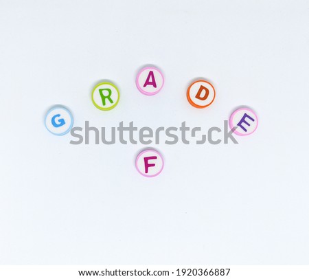color GRADE F circle alphabet on white background isolated