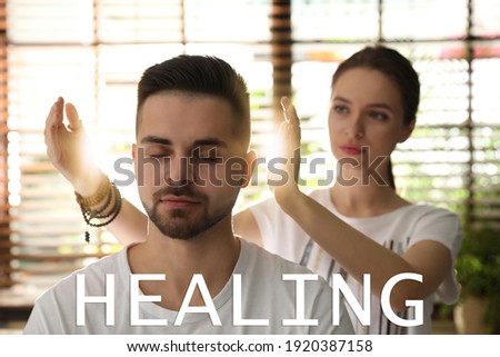 Young man during healing session in therapy room