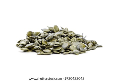 Seeds of gymnospermous pumpkin isolated on a white background. Pumpkin seeds