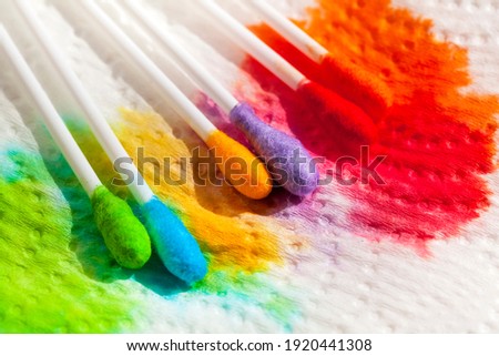 Cotton buds with different colors for coloring Easter eggs