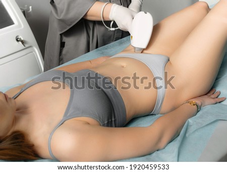 Bikini laser hair removal. Woman having laser epilation, hair removal on bikini zone. Body care and clean skin