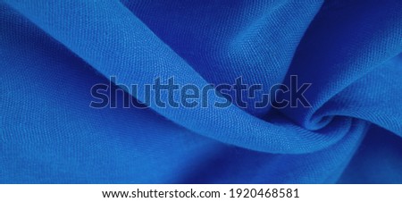 navy blue silk texture, blue fine grain fabric. desktop product, display perspective, studio photography. product demo banner.