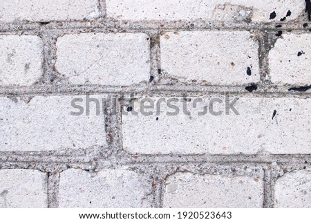 Gray brick wall close up, background or texture