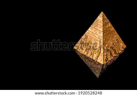 Golden pyramid with hieroglyphs on a black  background