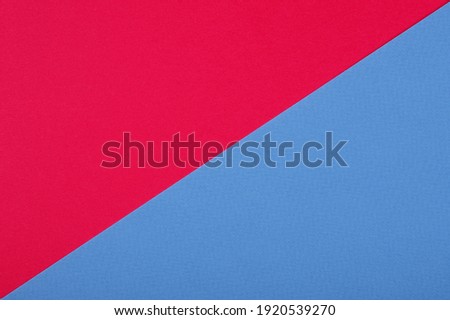 Plain red and blue background. Red and Blue cardboard. Red and Blue paper texture background. Abstract geometric diagonal flat composition. Copy spaces