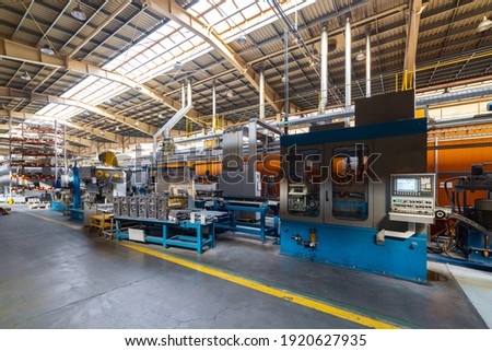 The interior of the metalworking shop. The interior of the metalworking shop. Modern industrial enterprise. Royalty-Free Stock Photo #1920627935