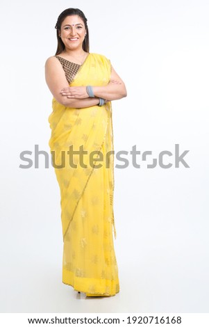 Beautiful Indian woman portrait over white background.