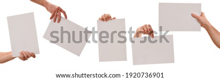 Set of five hands holding a white sheet a4 in different positions with white isolated background