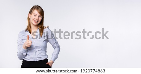 Beautiful specialist and businesswoman on an isolated white background promotes and supports your information which can be entered nearby. Education,busines and marketing concept. High quality photo
