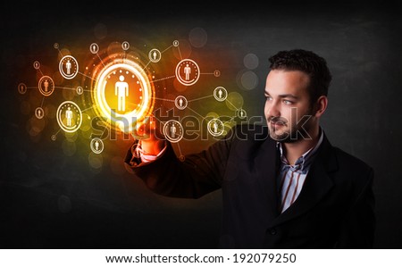 Modern man touching future technology social network button 