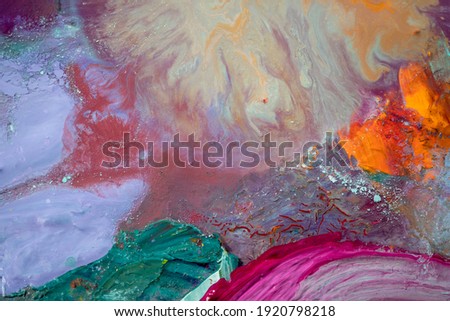 Abstract colorful background. Close-up of mixed oil paints