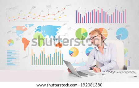 Business woman with colorful charts graphs